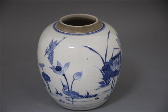 A Chinese blue and white ovoid jar, Kangxi period, H. 20.5cm, excluding wood stand and cover
